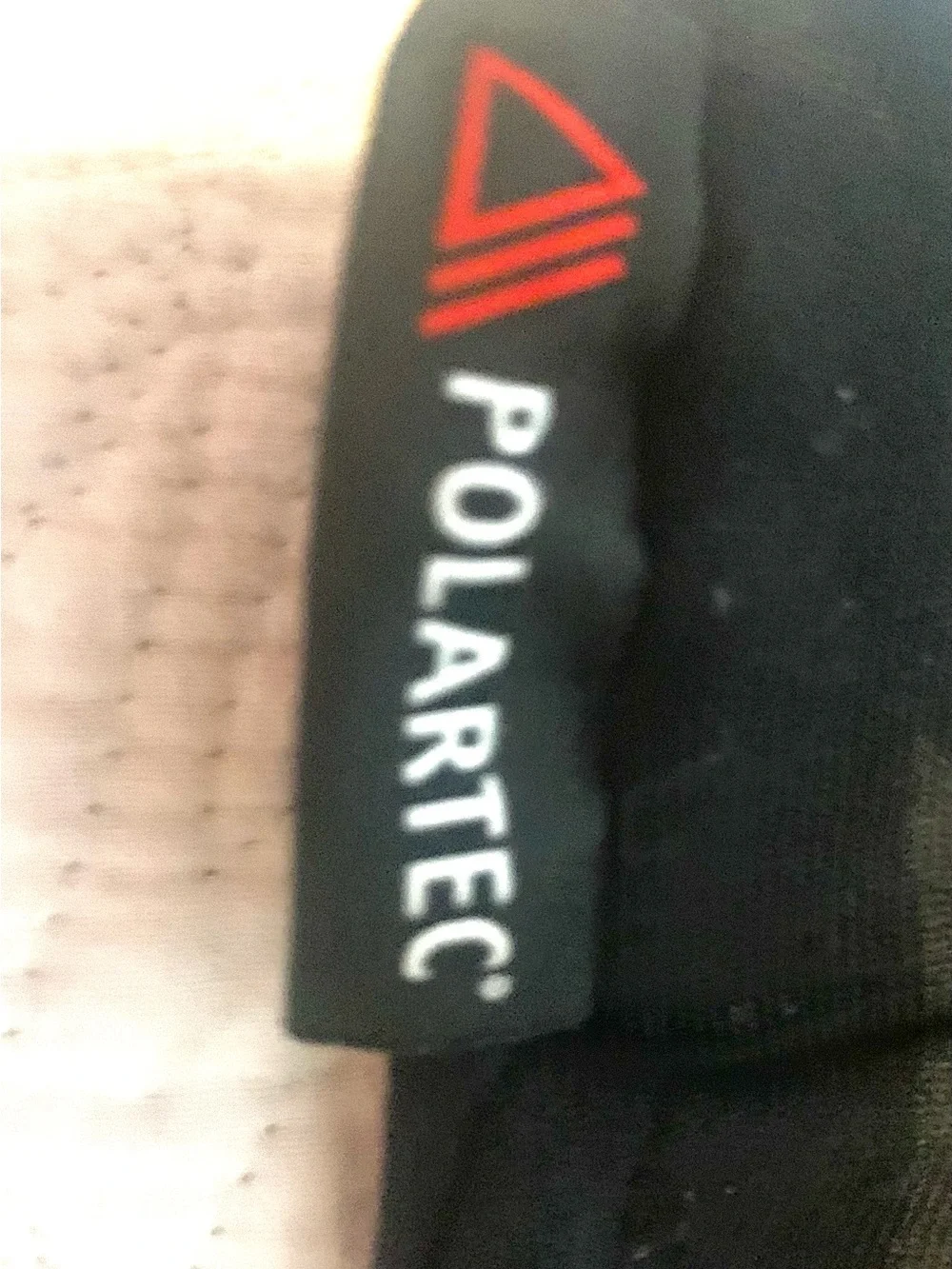These north face gloves are mostly black, made with Polartec. Size XS
